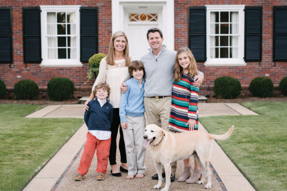 Regent University alumnus Sean Knox with his family and dog.