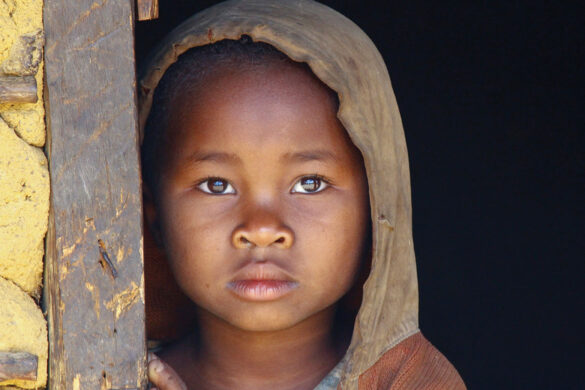 A child standing in the doorway